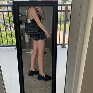 Black leather bag with chain straps